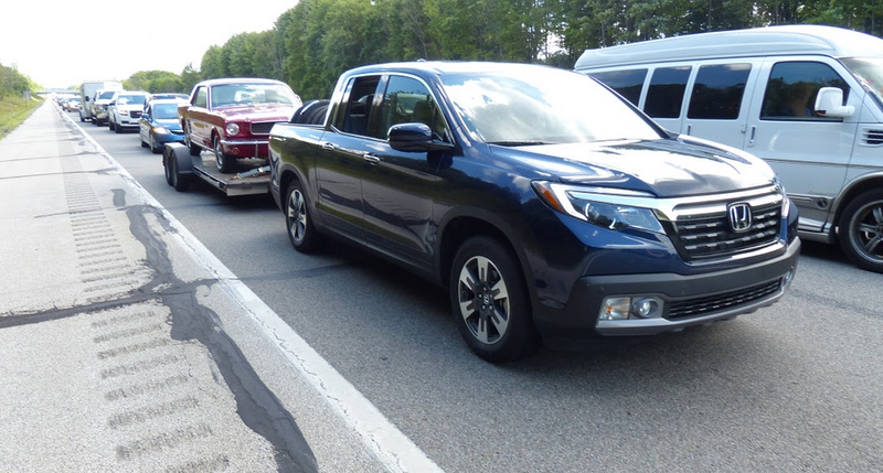 Illustration for article titled This 2017 Honda Ridgeline Towed A Classic Mustang Over The Appalachian Mountains Like A Champ